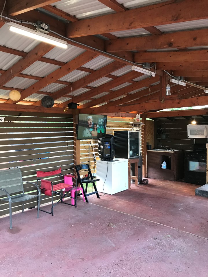 outdoor space complete with stove and microwave