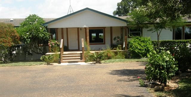 front entrance very private large 120x280 lot with 37 different mature trees and shrubs. automatic lawn sprinkler installed in 2016. space includes privacy fence and paved driveway.